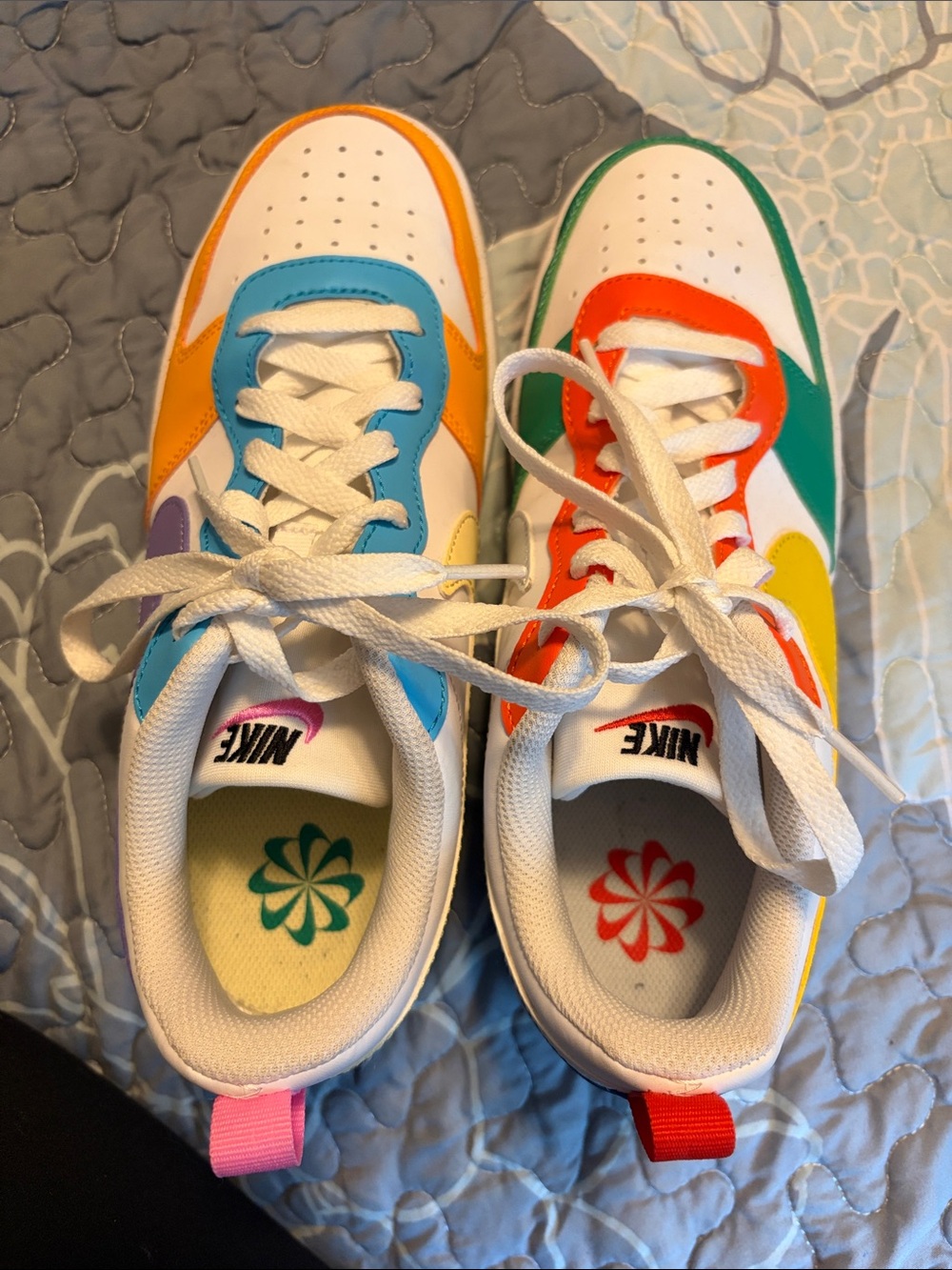 Nike Kids White Sneakers with Blue, Orange, Green & Red Accents